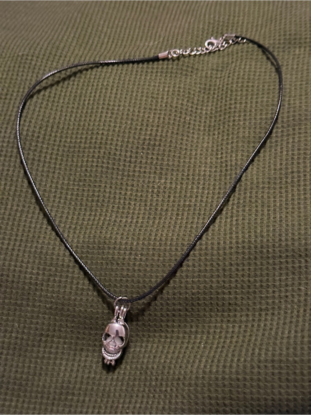 Silver Skull Pendant Necklace in Black Cord